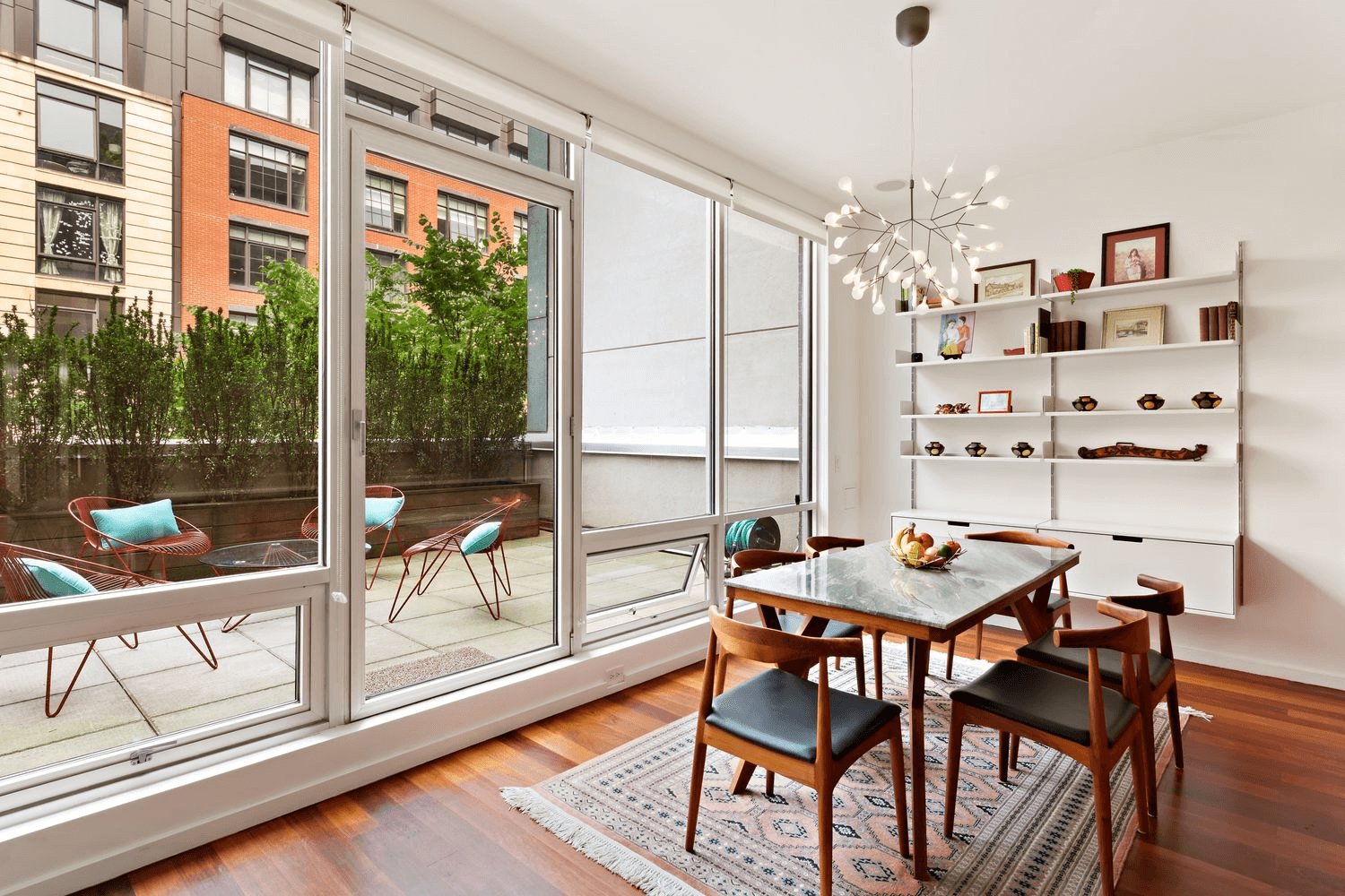 dining area with wall of glass and door out to terrace