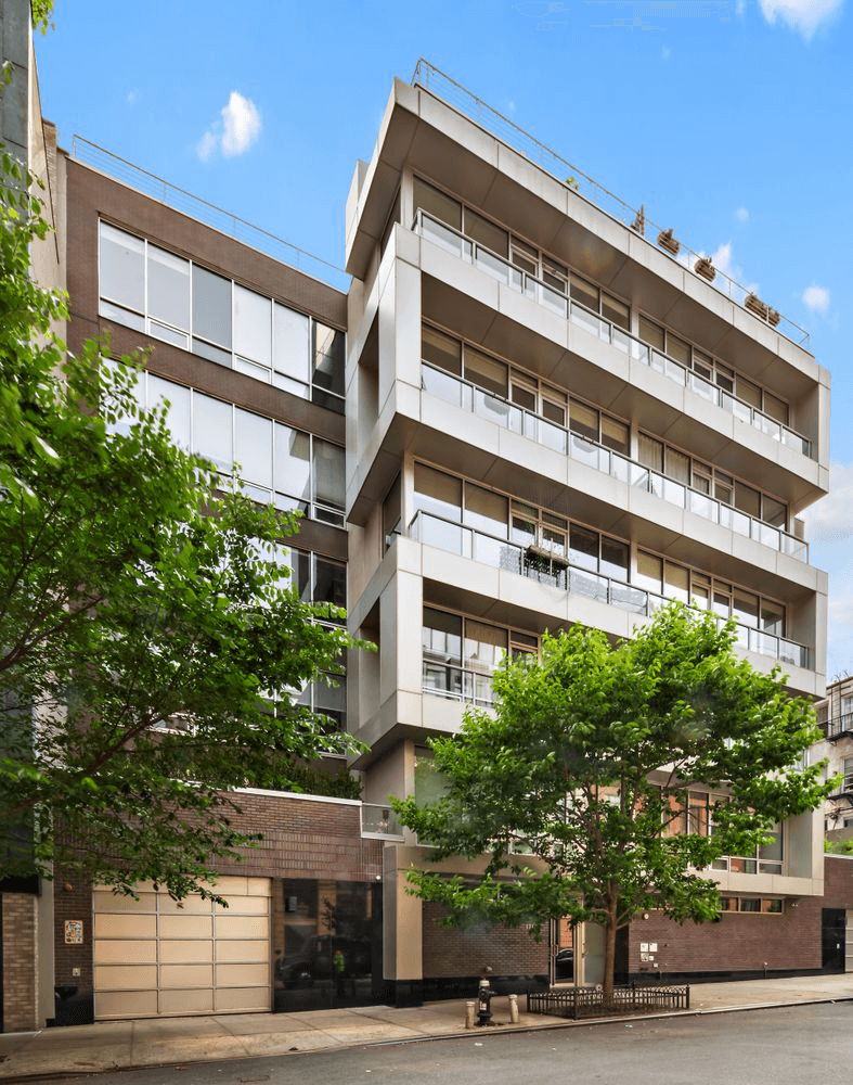 exterior of the building with view of terraces across front facade
