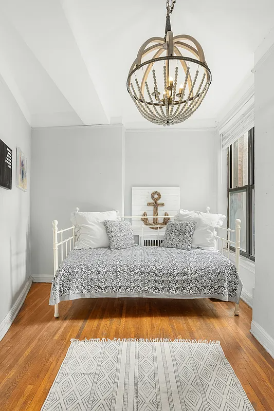 bedroom with wood floors