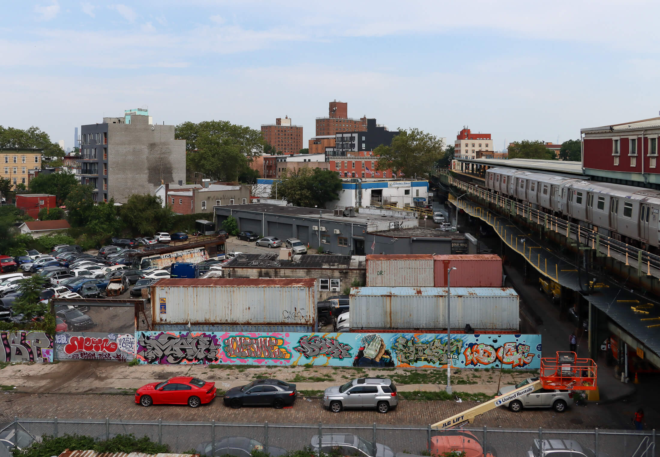 view from the station looking out over a parking lot and industrial buildings