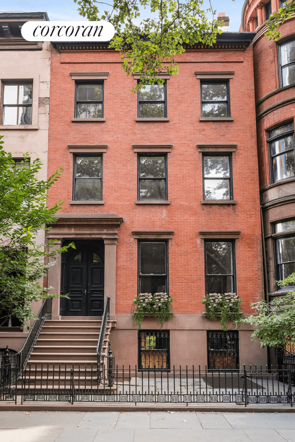 three bay wide, red brick exterior