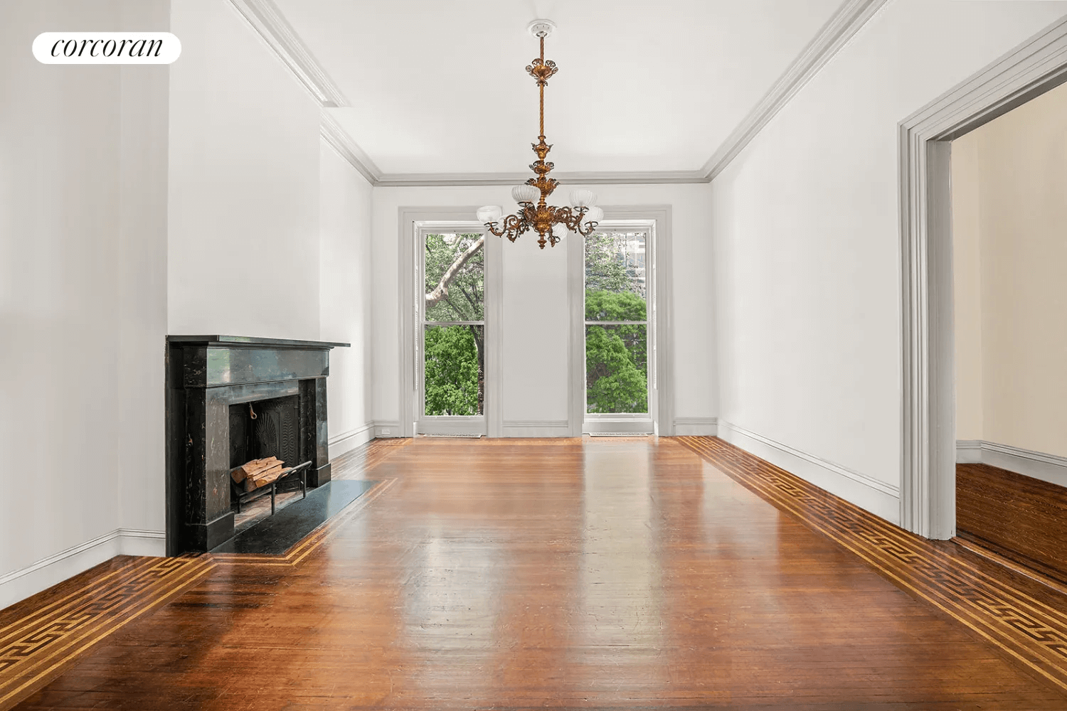 parlor with black marble mantel