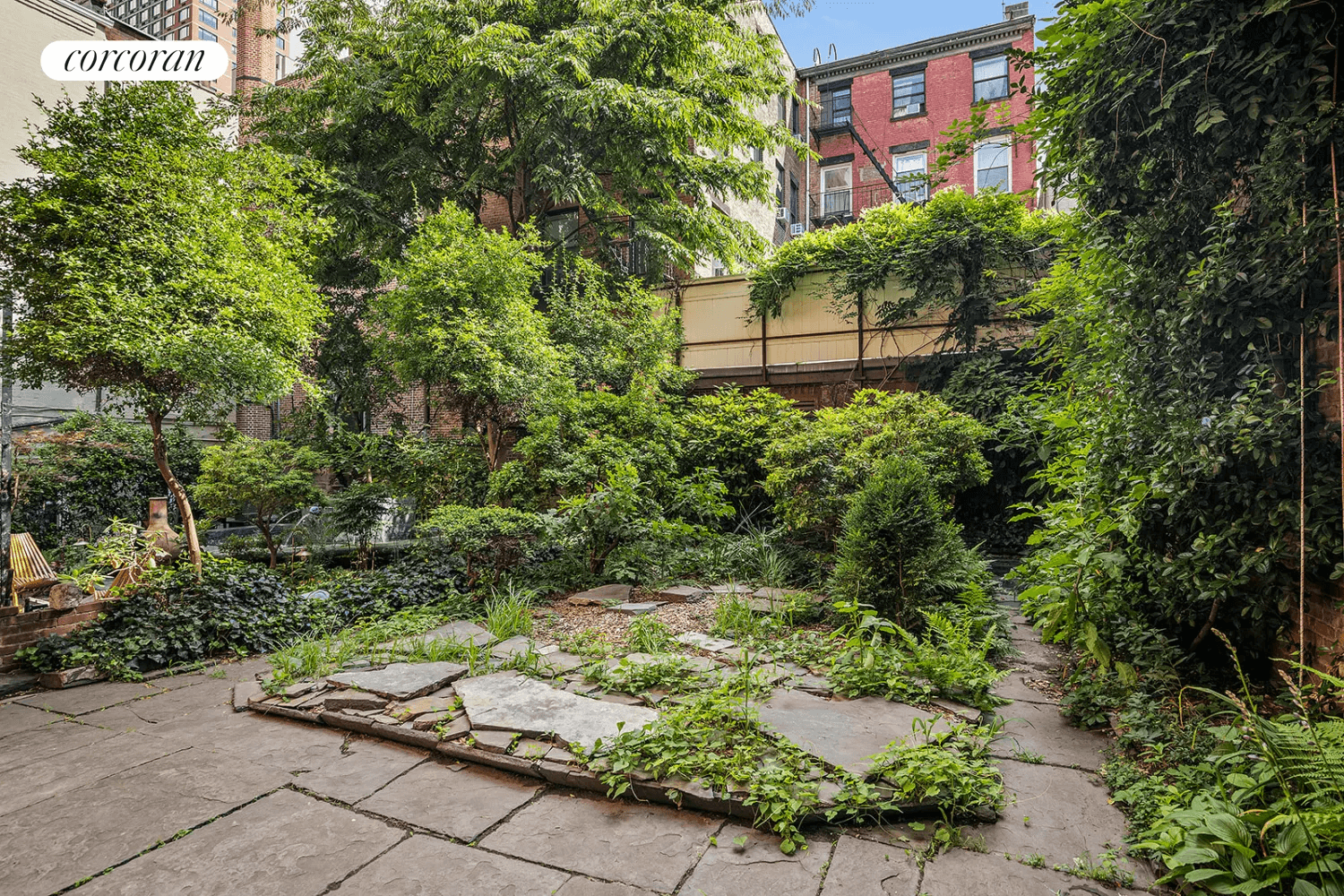 garden with pavers and shrubs and perennials