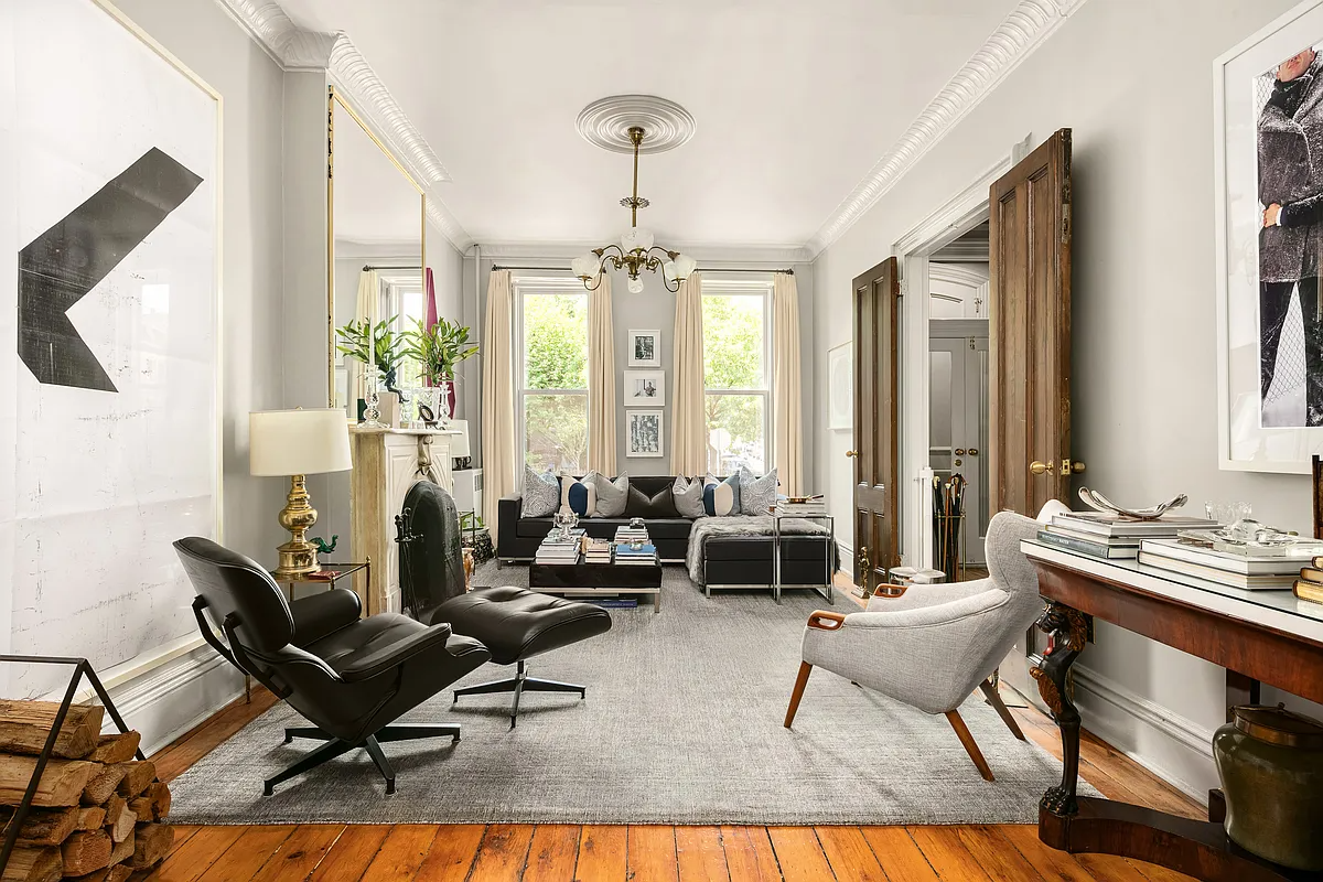 parlor with marble mantel and ceiling medallion