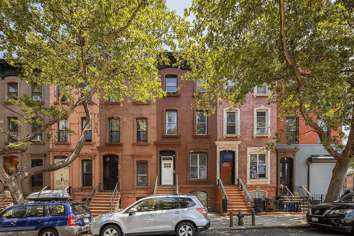 a row of brick and brownstone houses