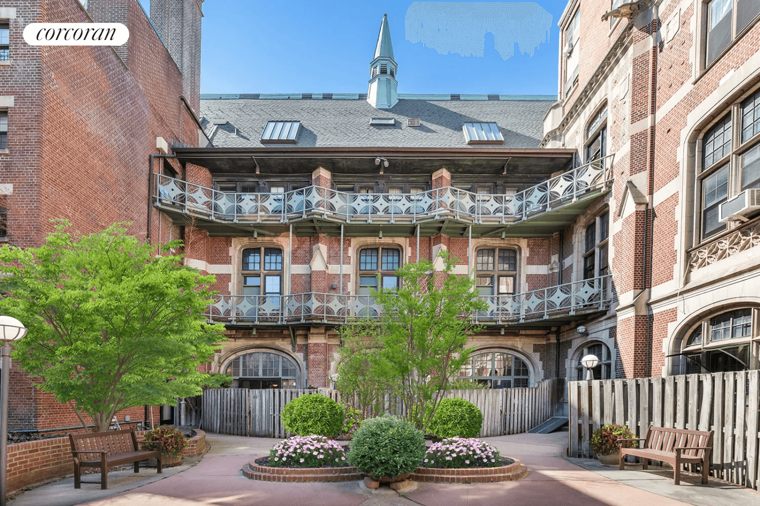 courtyard of the building showing benches and planting beds