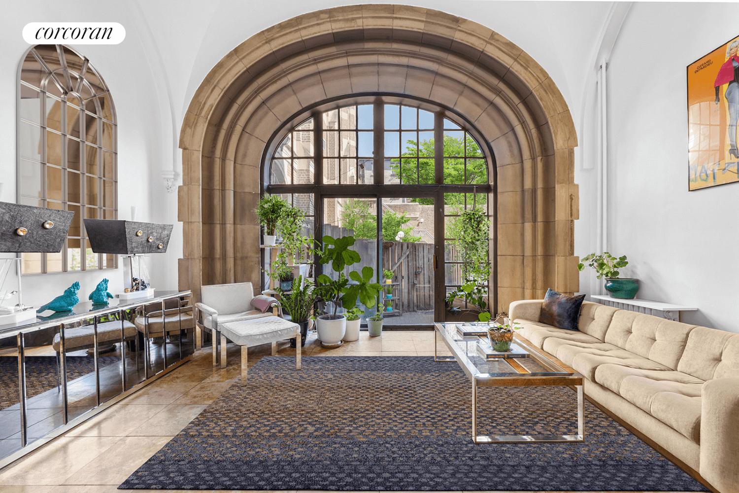 clinton hill condo - living room with massive stone arch out to patio