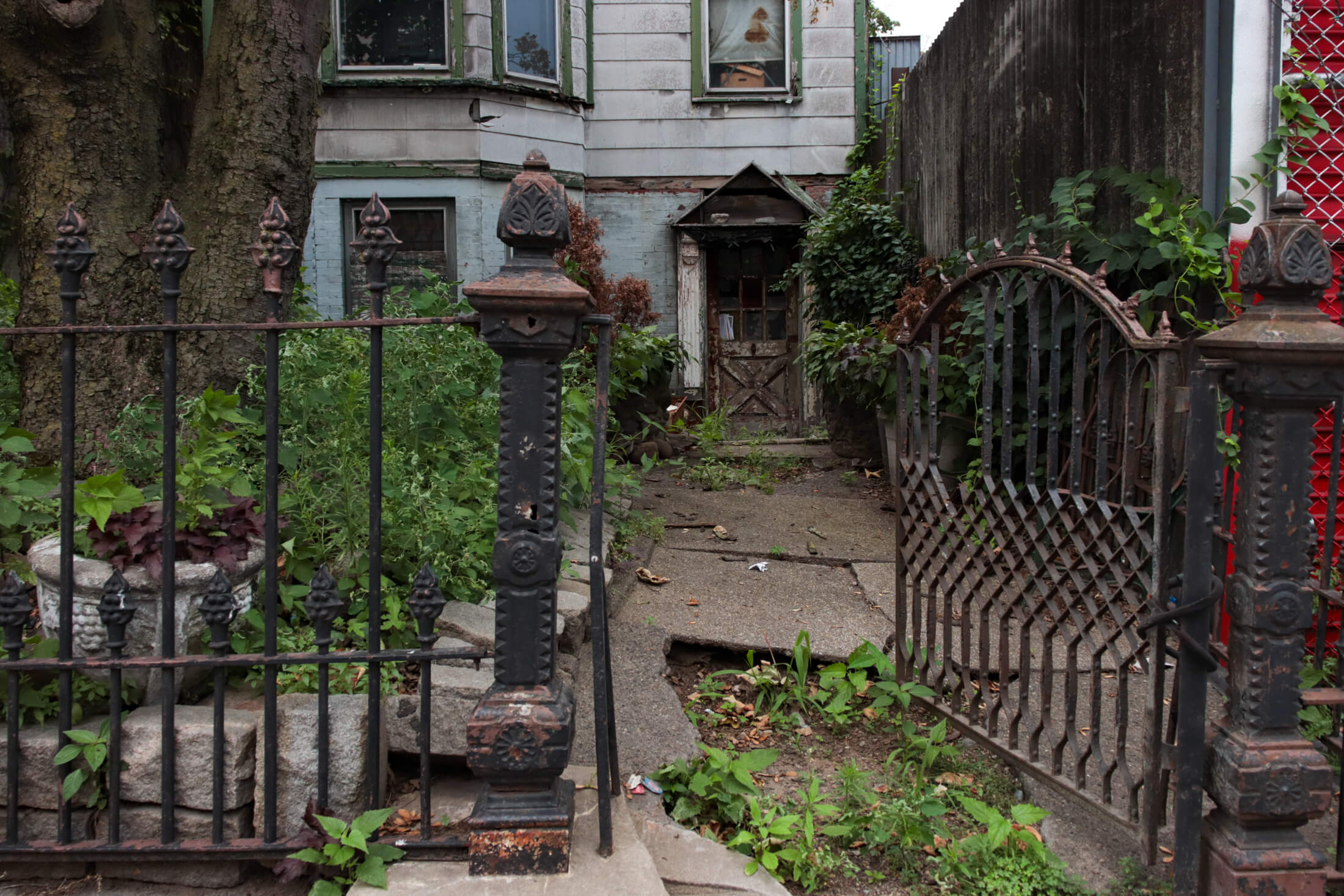 a 19th century iron fence and gate