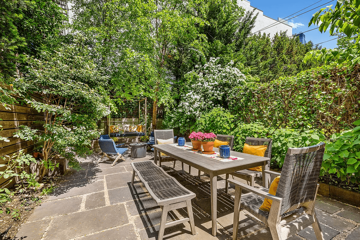 a stone patio with room for a dining table