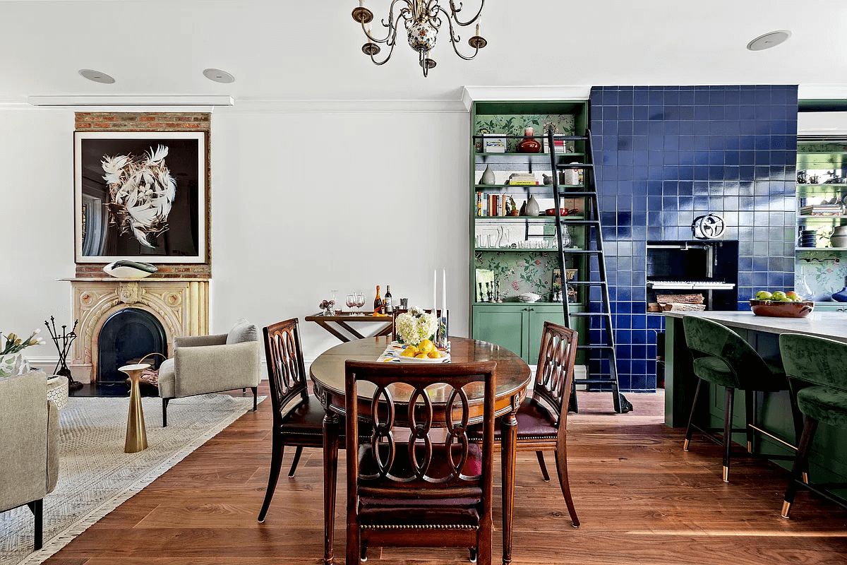 park slope - the dining area next to the blue tiled fireplace wall in the kitchen