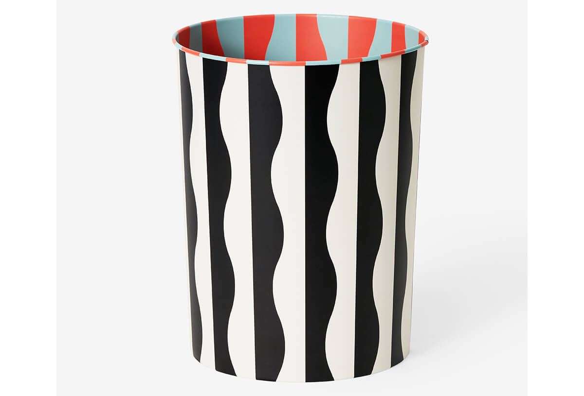 a wastebasket with black and white wavy lines