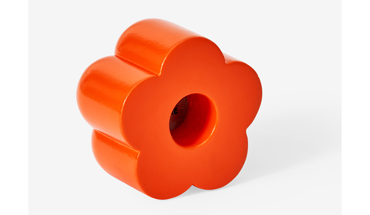 a red poppy shaped candleholder