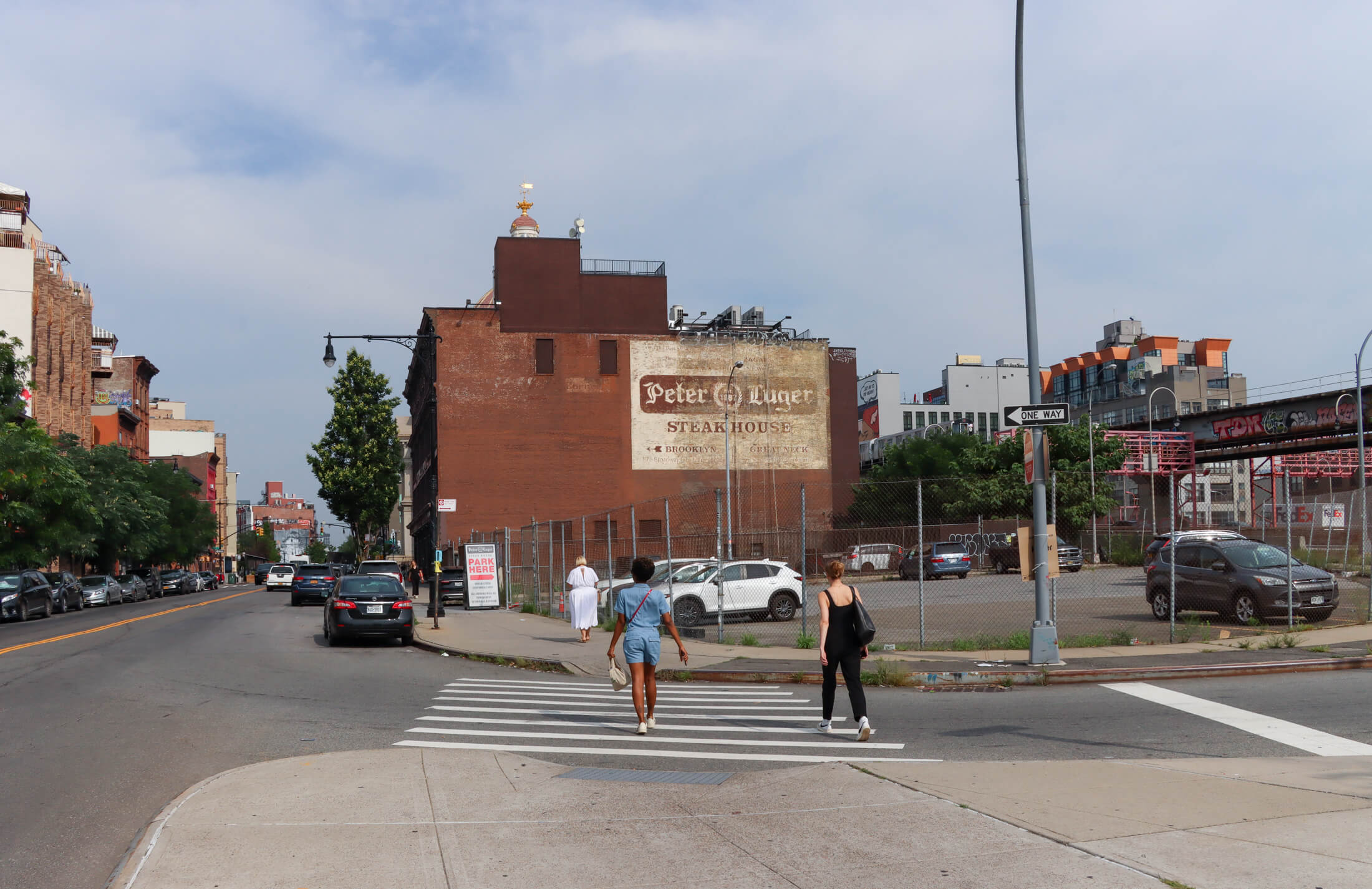 people walking along Broadway