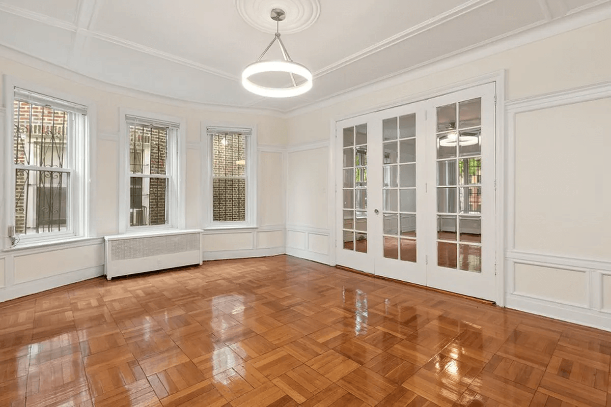 dining room with french doors into living room