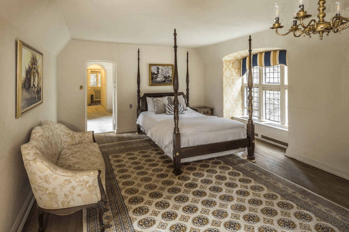 bedroom with chandelier