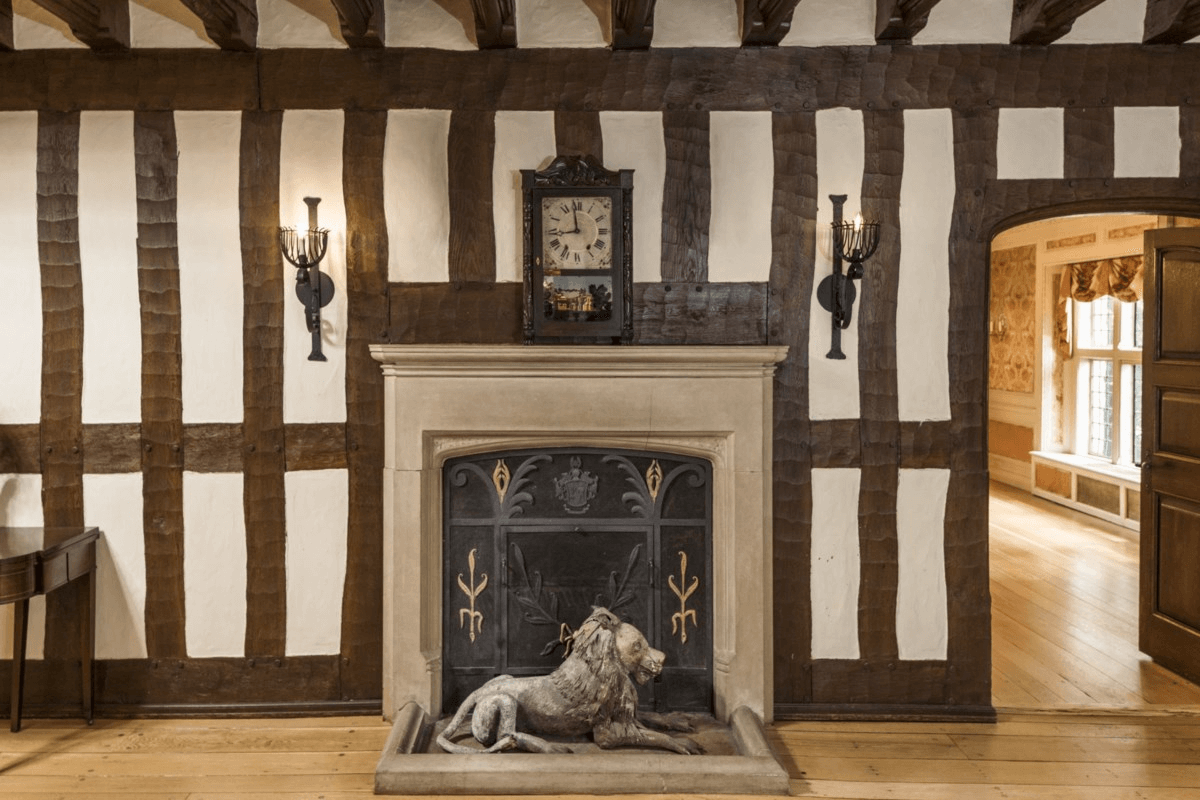 mantel and half timbering in the entry hall