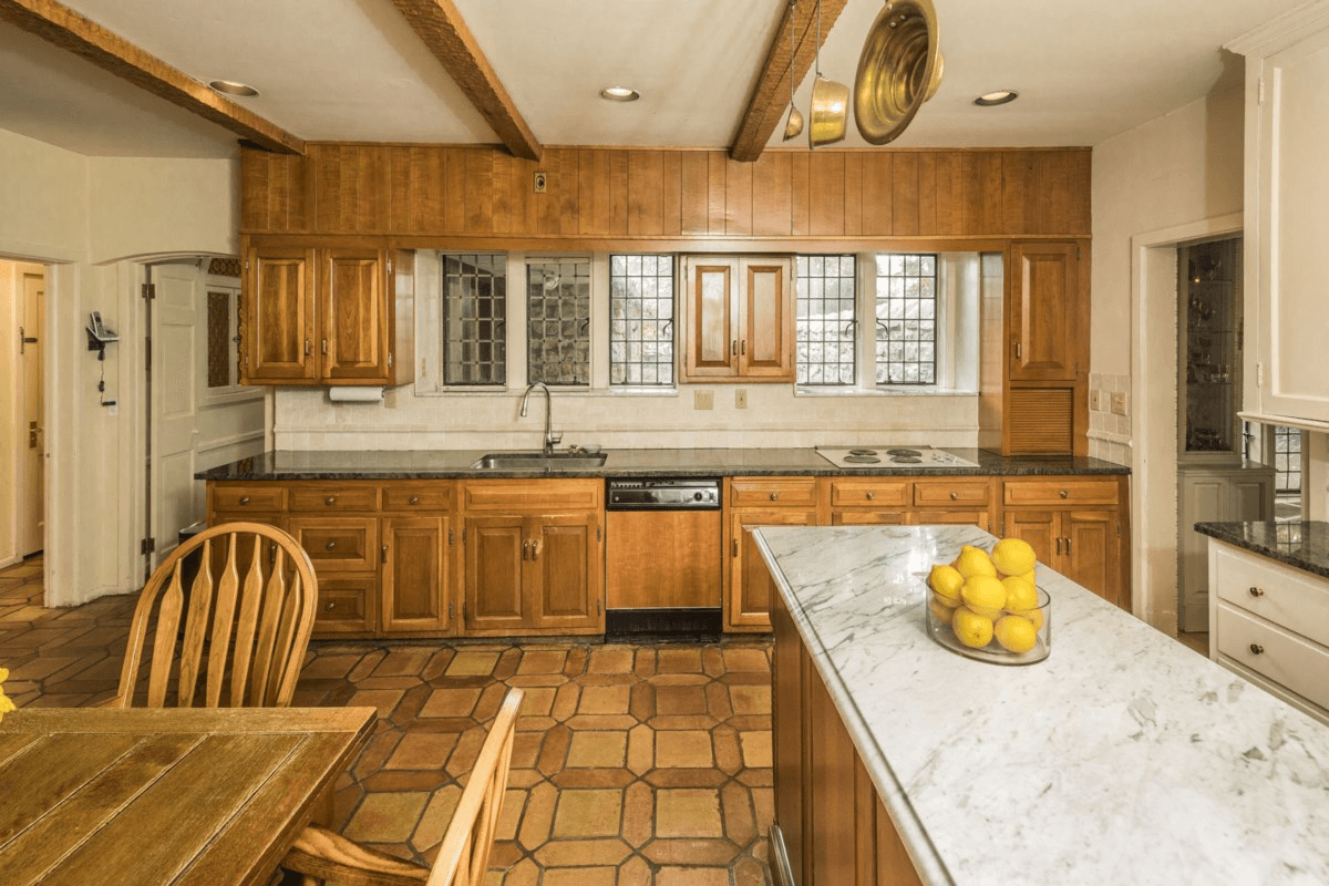 kitchen with tile floor and wood cabinets