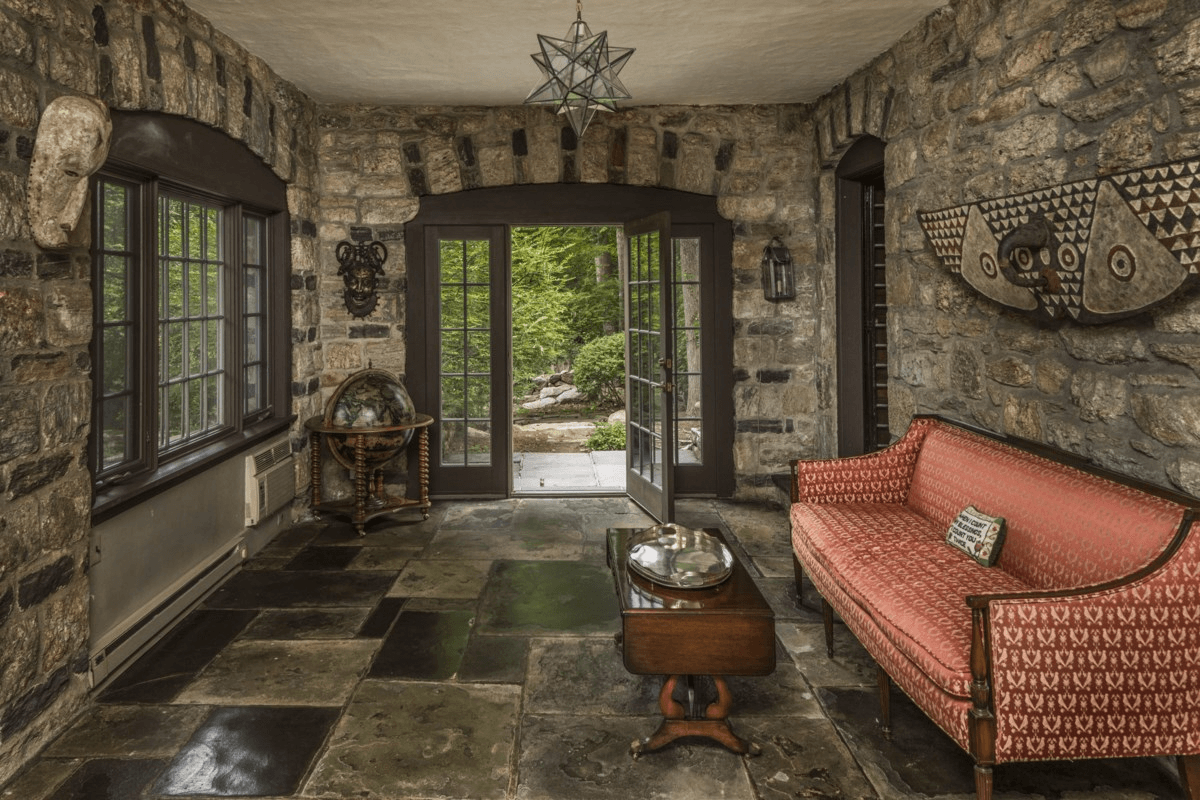 stone floor in the enclosed porch with door to the garden