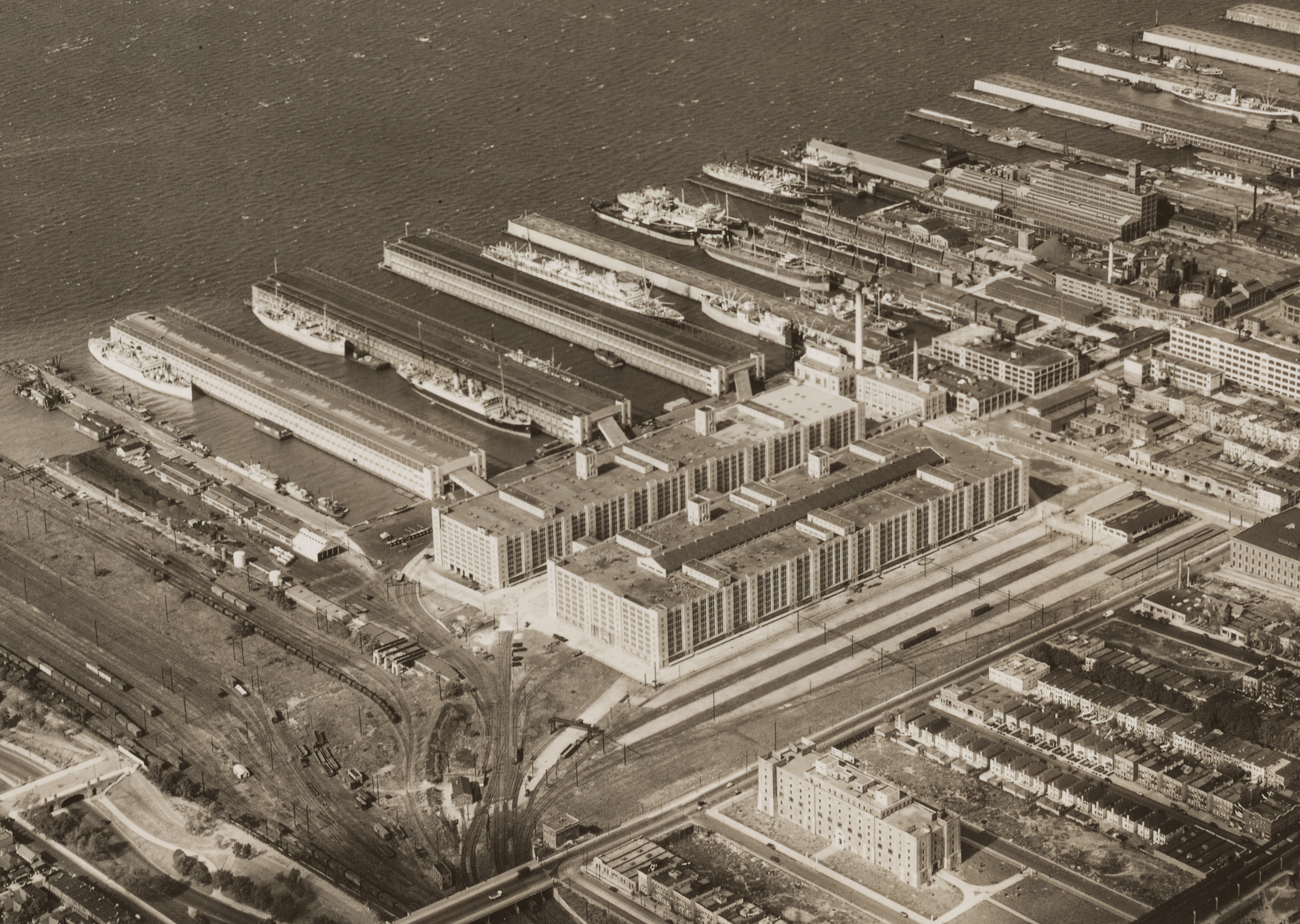 an aerial view of the building looking towards the harbor