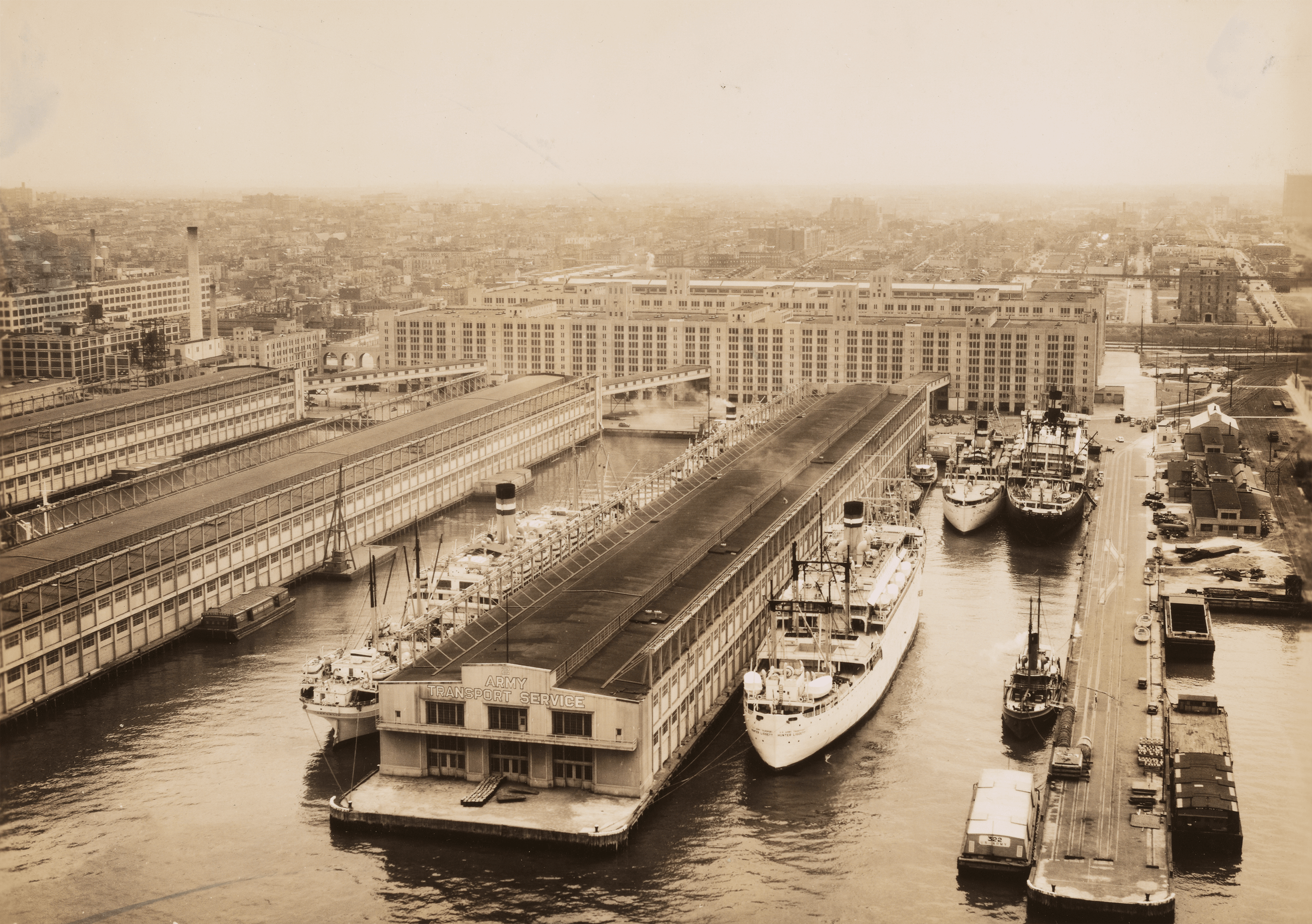 an aerial photo showing piers in front of the complex 