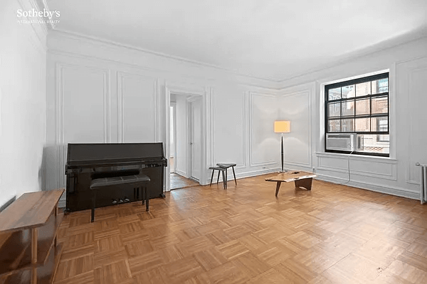 living room with wall moldings, picture rail and parquet floor