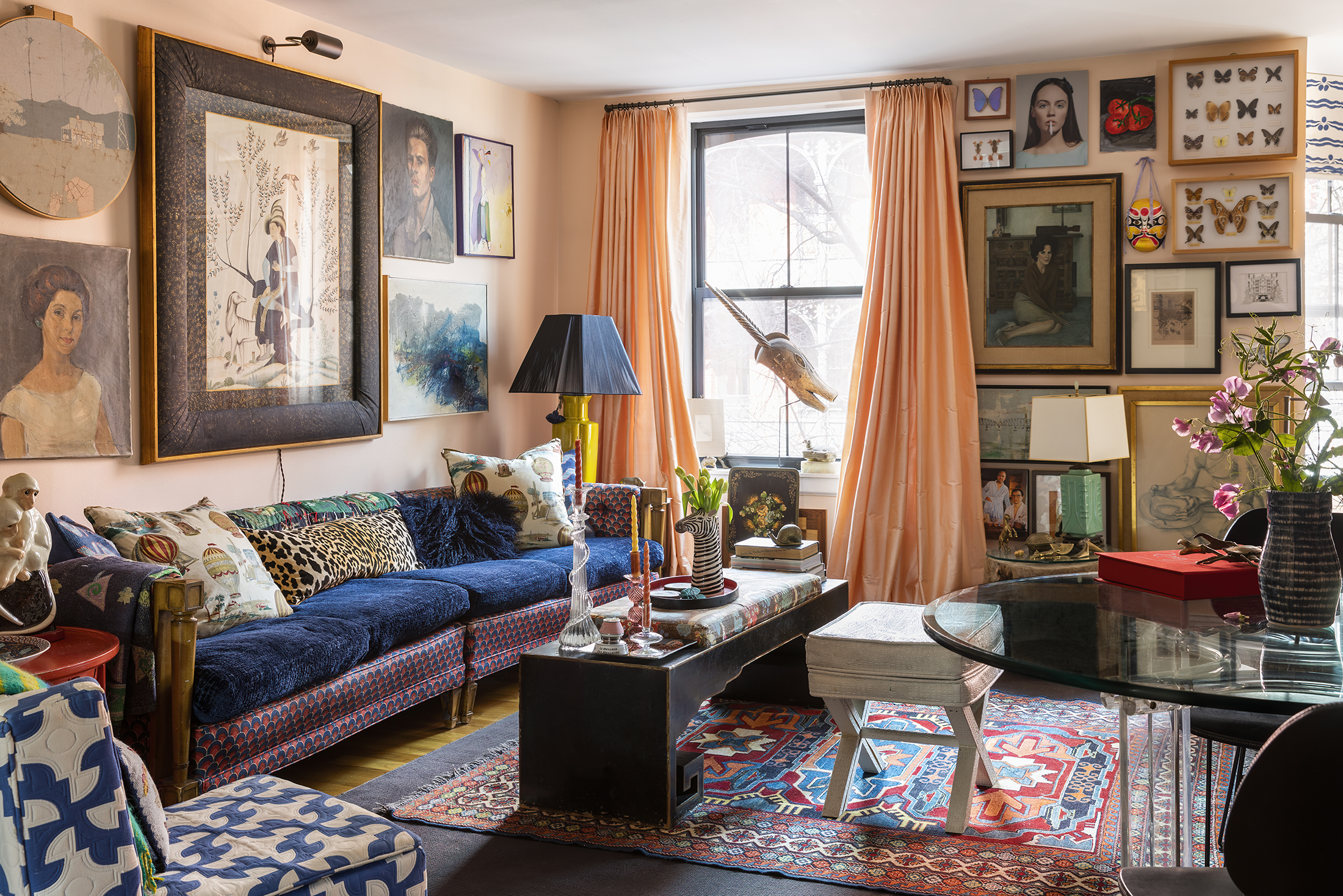 brooklyn design - a living room with pale pink walls and a large sofa