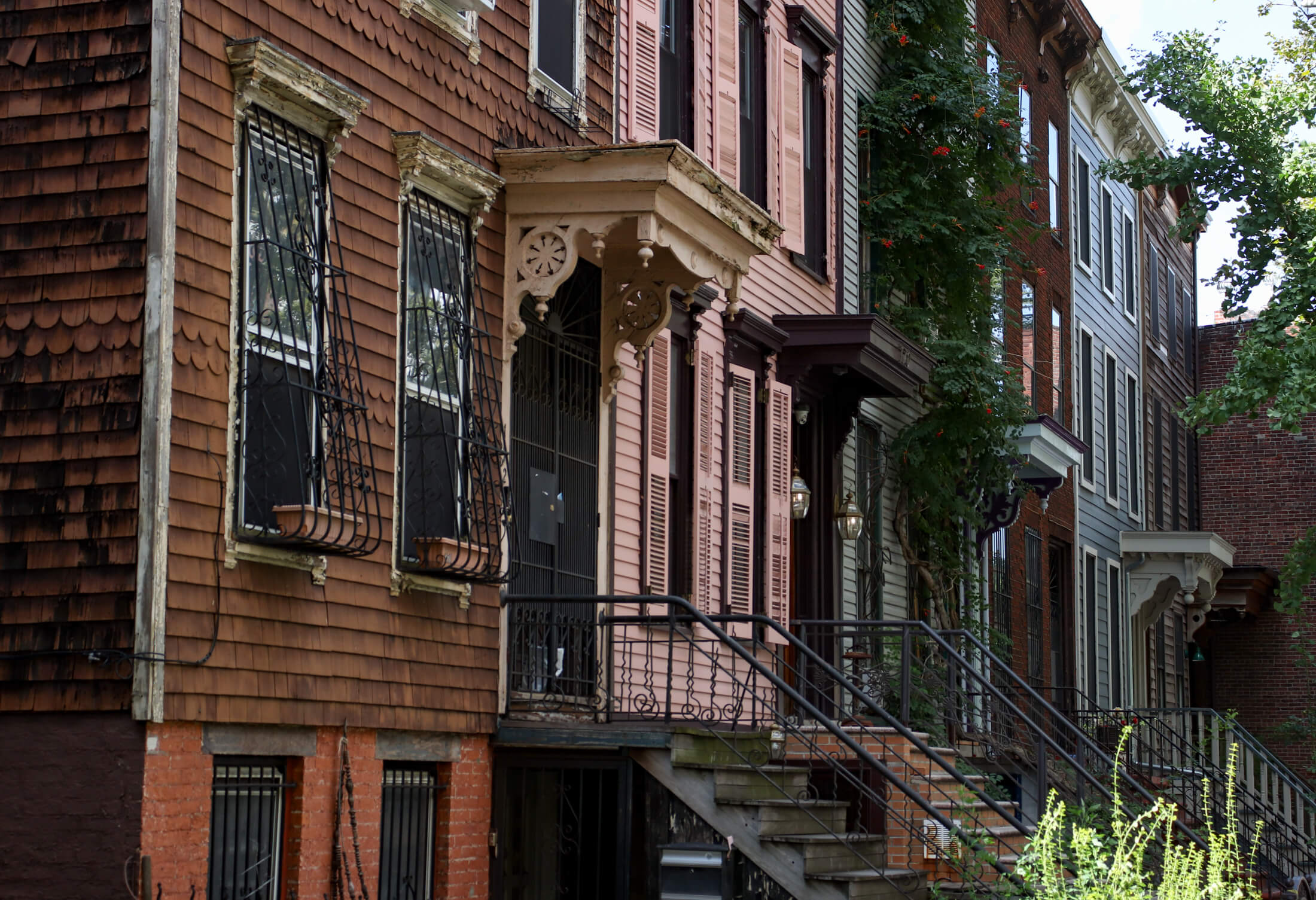 a row of wood frame houses