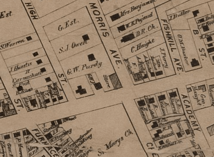 a black and white map showing properties on the block labelled G W Purdy