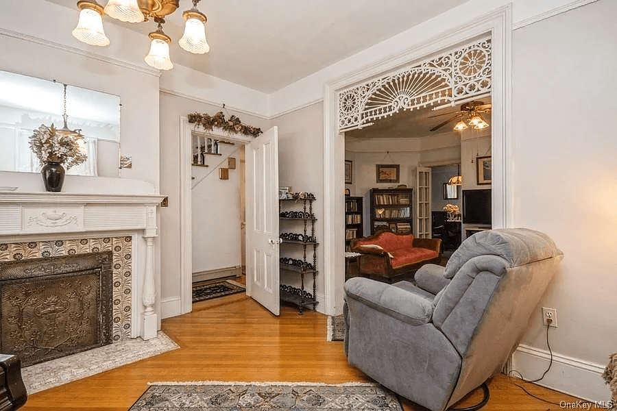 parlor with fretwork in the doorway