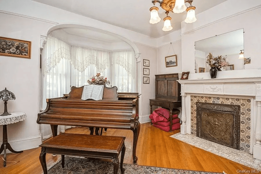 parlor with window niche and mantel