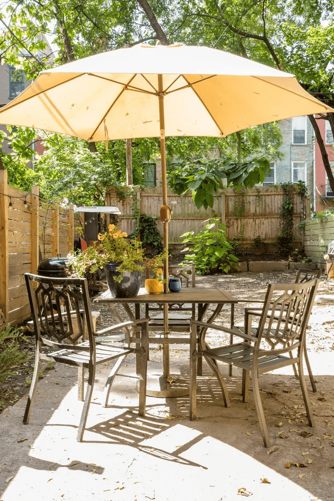 fenced-in rear yard with a patio