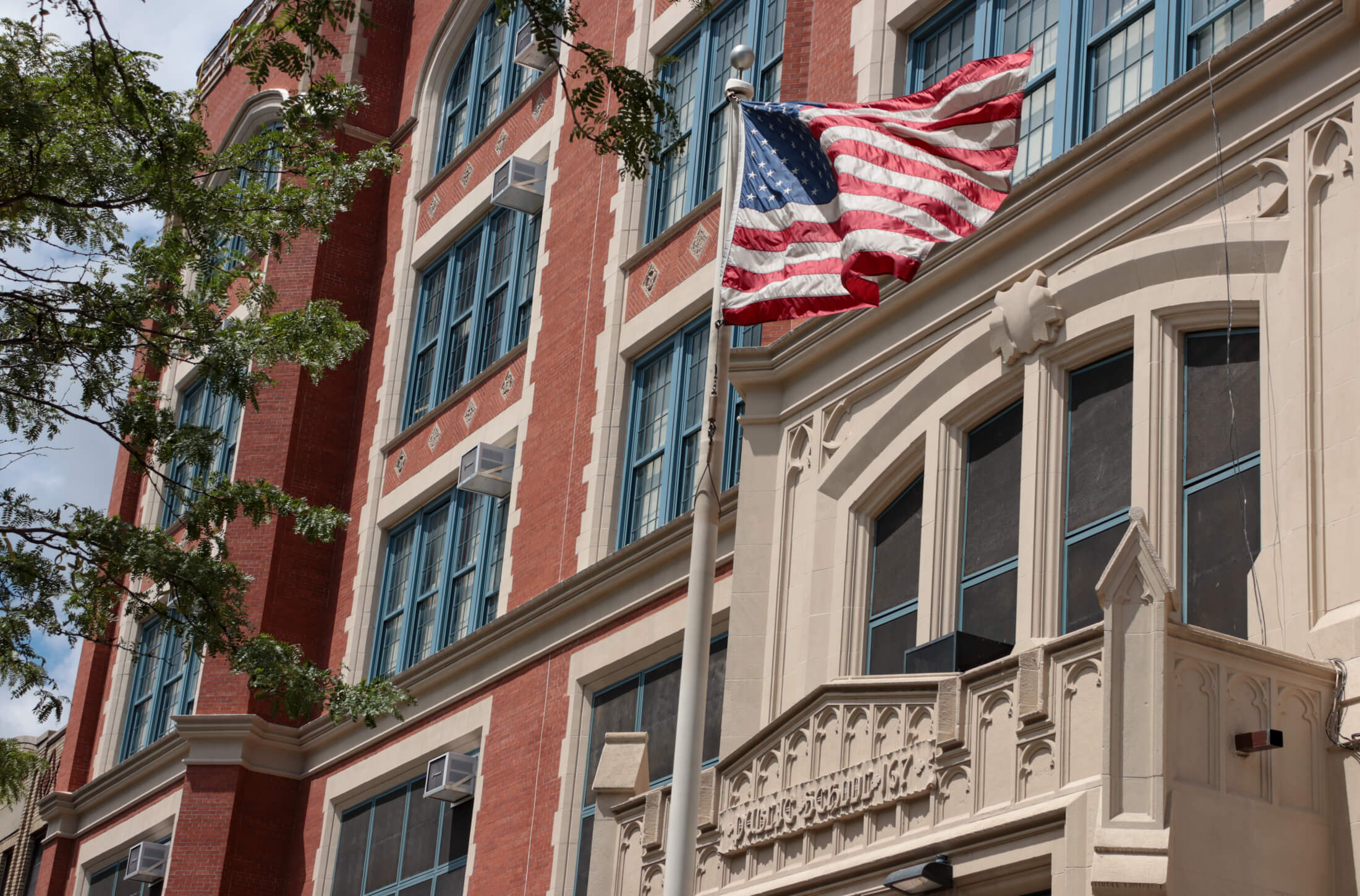 brooklyn - a flag waving in front of the former PS 167