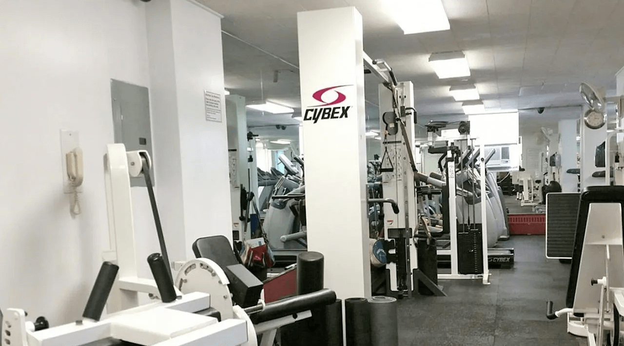 gym in building with mirrored wall