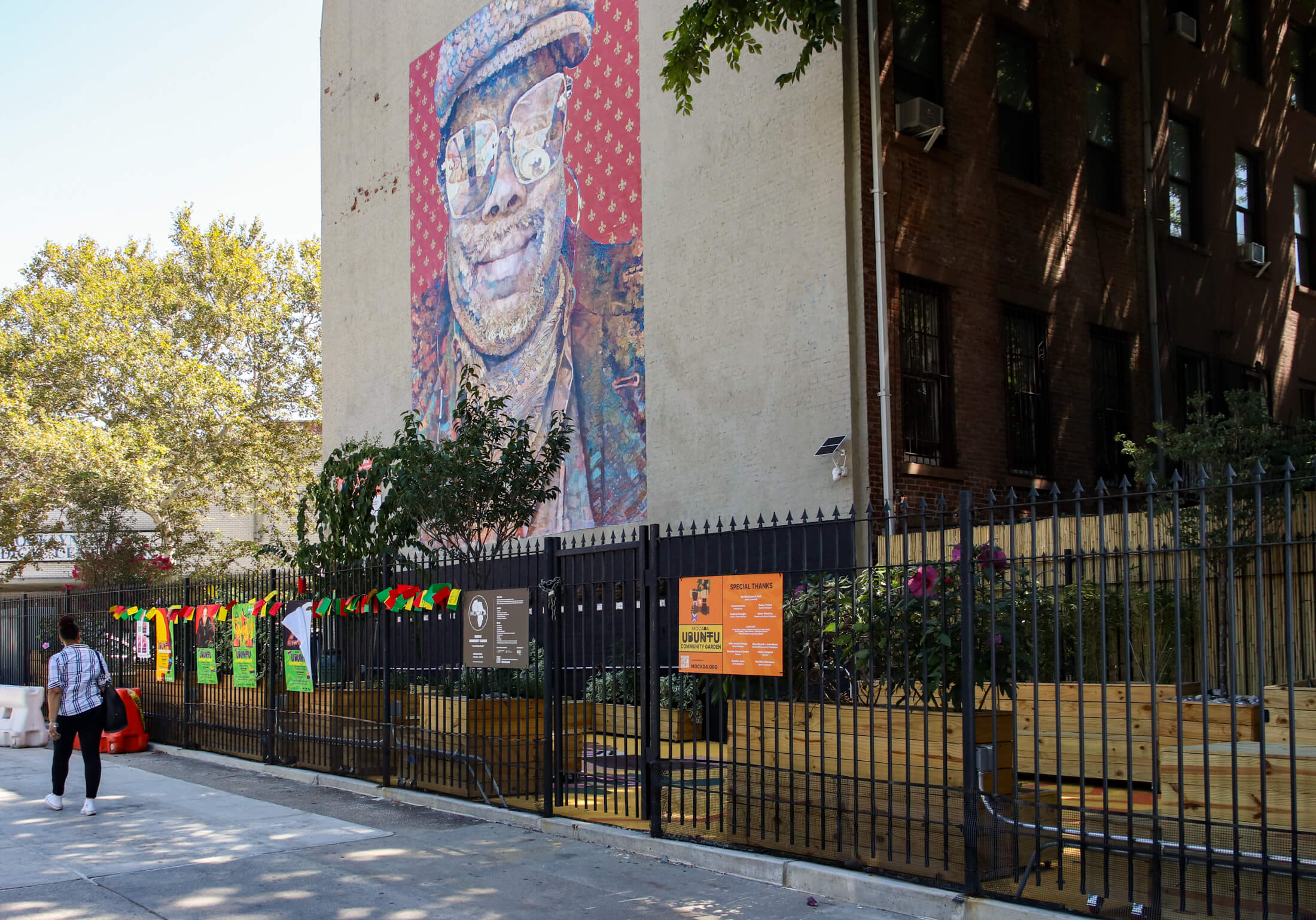 woman walks by the new park