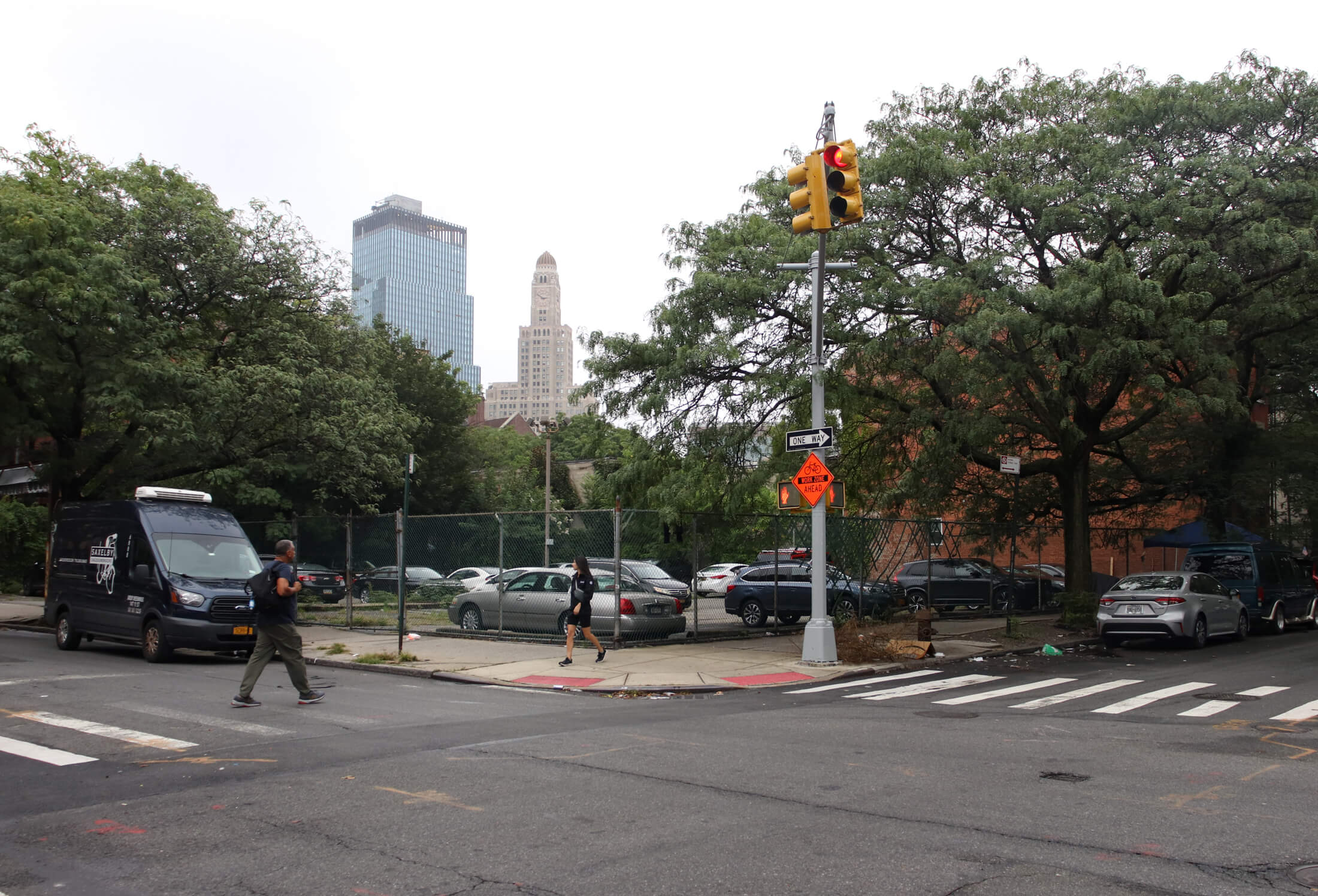 A view of the chain link fence around the corner of Nevins and Wyckoff Streets