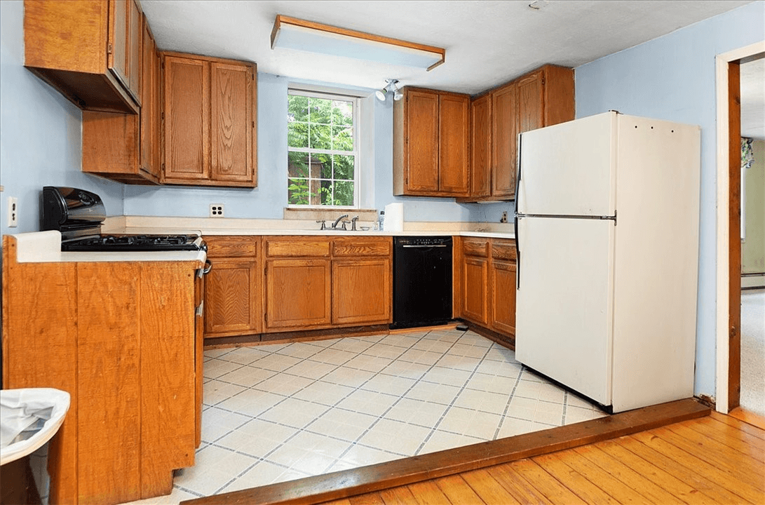 kitchen on a raised platform with wood cabinets