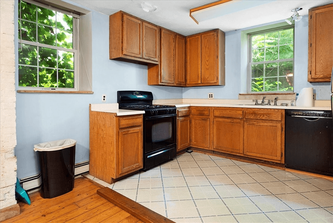 kitchen on a raised platform with wood cabinets