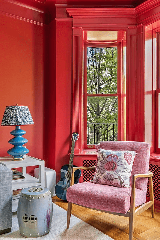 living room on the second floor with red walls