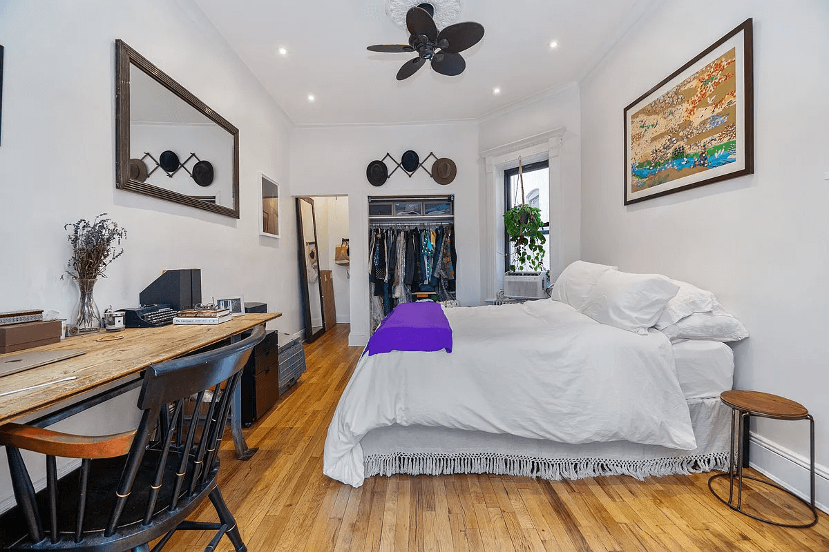 bedroom with view of a closet