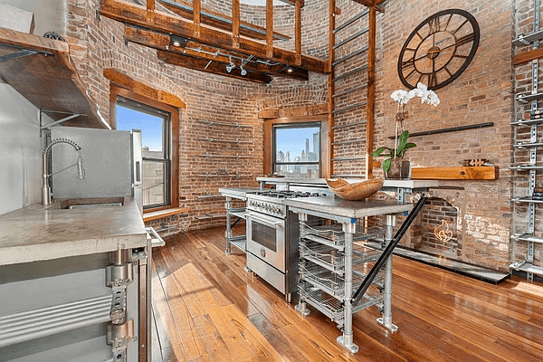 kitchen with exposed brick