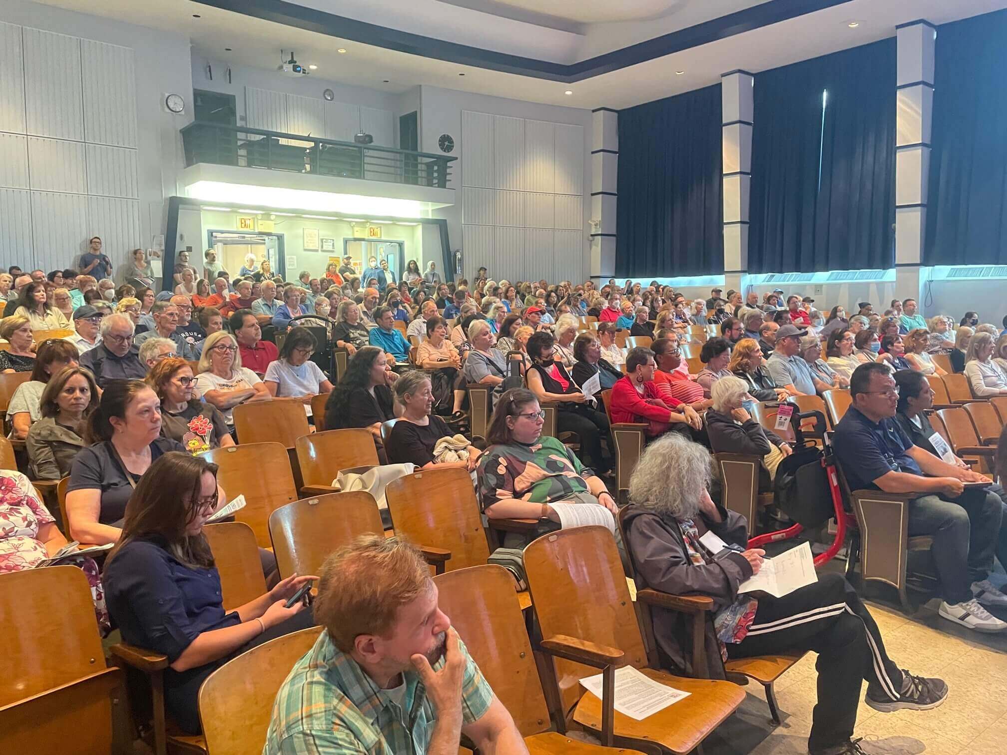 people sitting in an auditorium