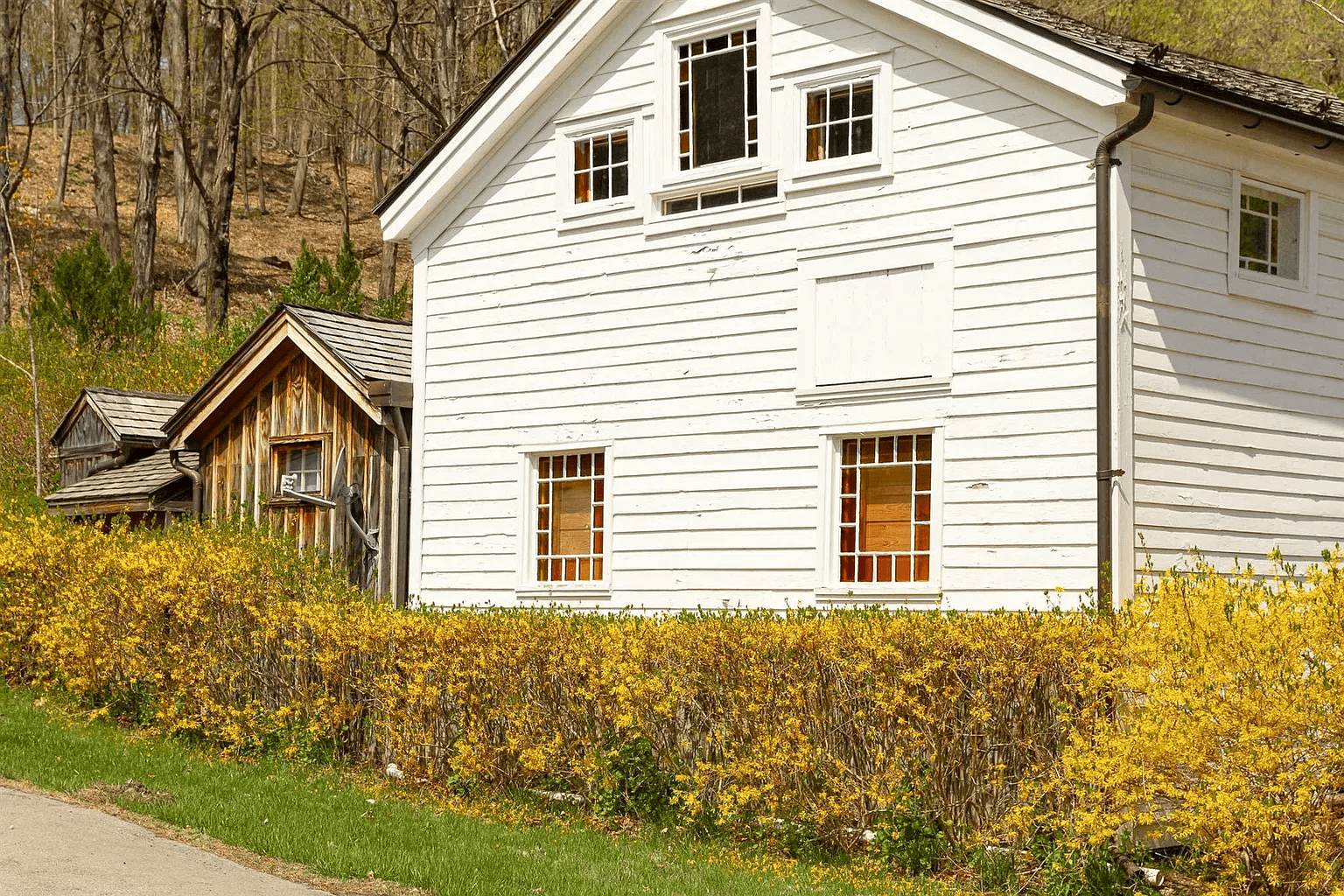 exterior of the house with stained glass windows visible