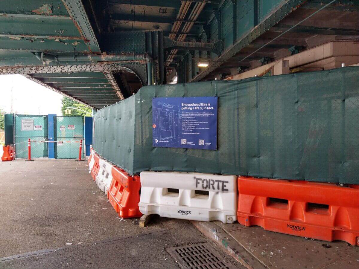 sheepshead bay - construction fence at the subway station