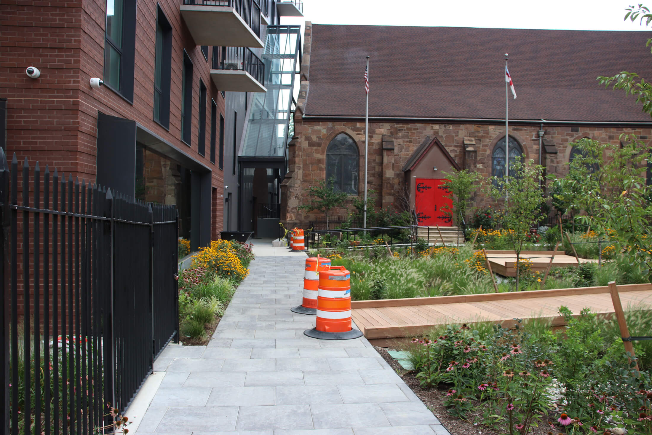 the historic st mary's next to the modern housing