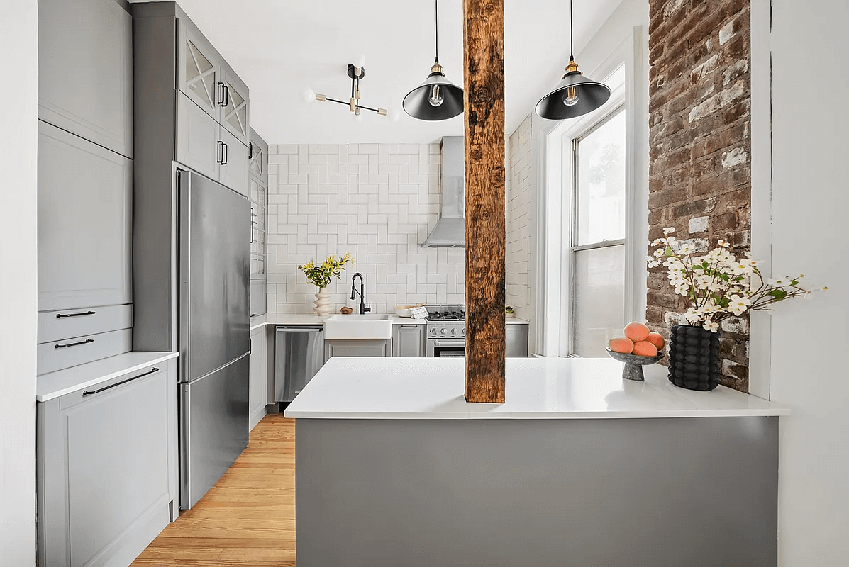 kitchen with a wood column running through island