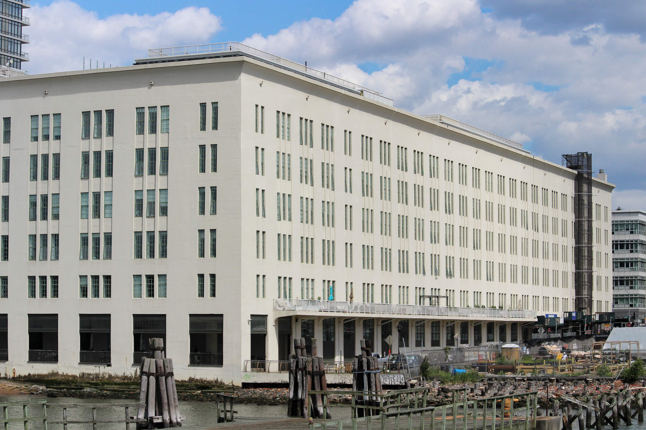 a waterfront view of the large warehouse now residences