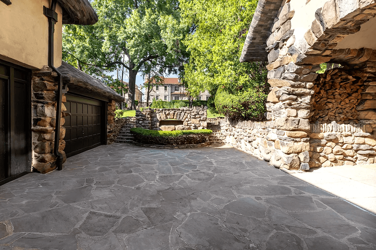 stone paved parking and garage