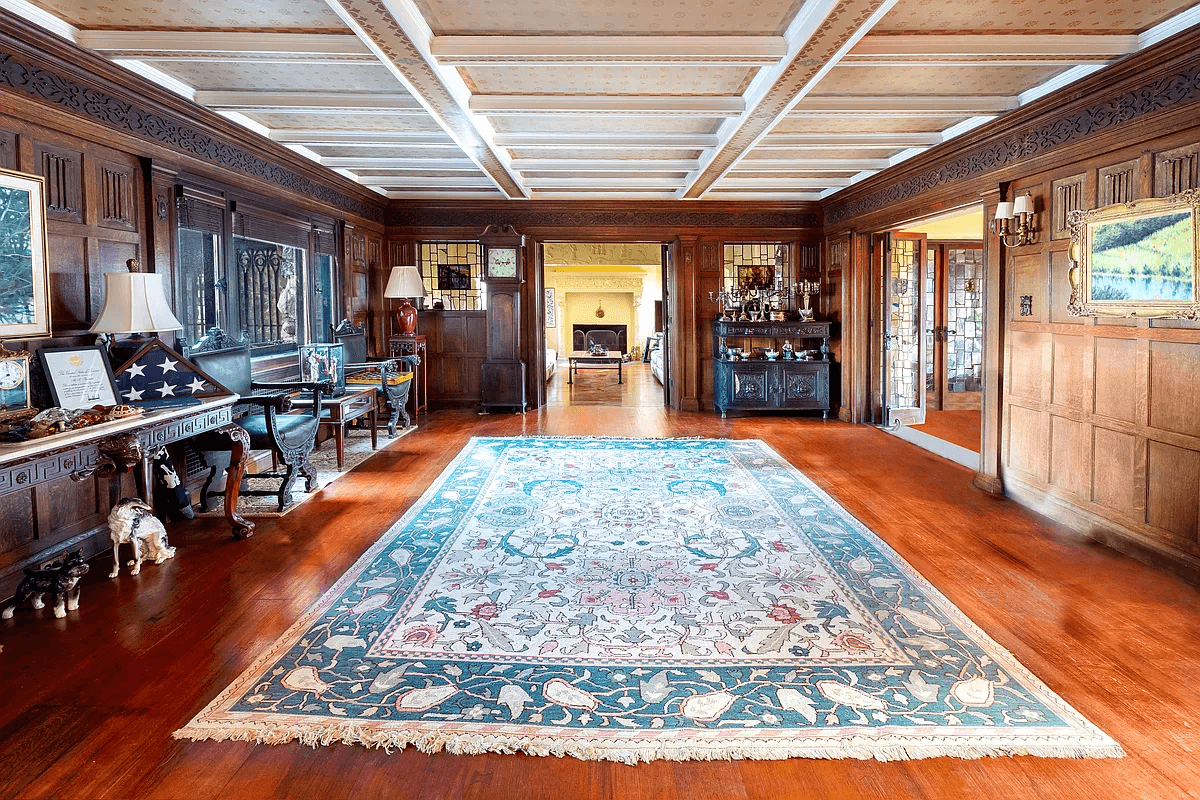 main hall with coffered ceiling and paneled walls