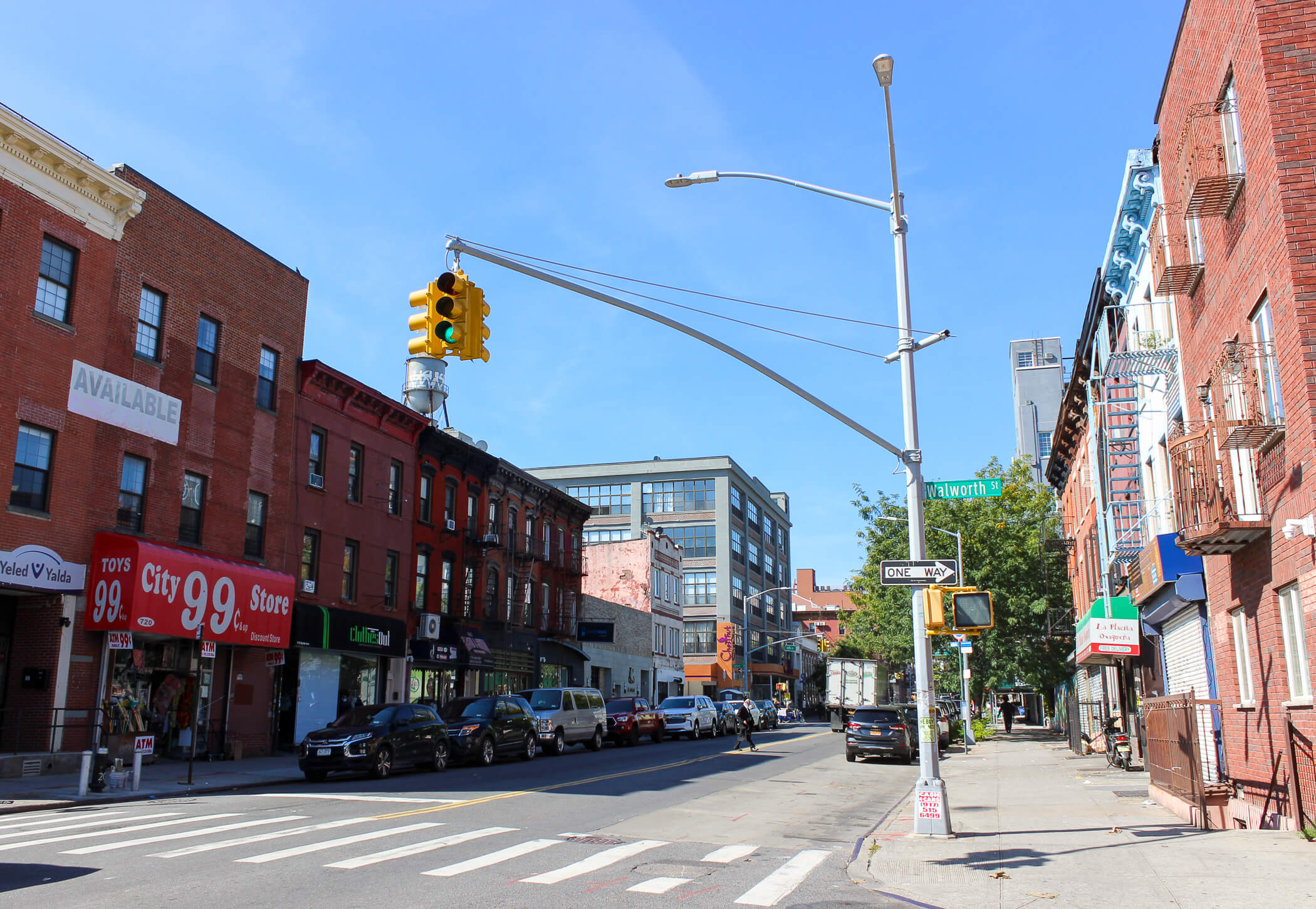 view on myrtle avenue showing low scale brick buildlings