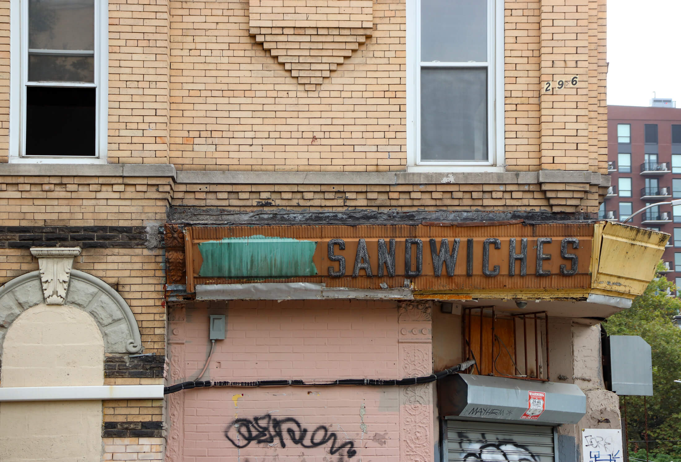 brooklyn-sandwhiches sign on a brick building